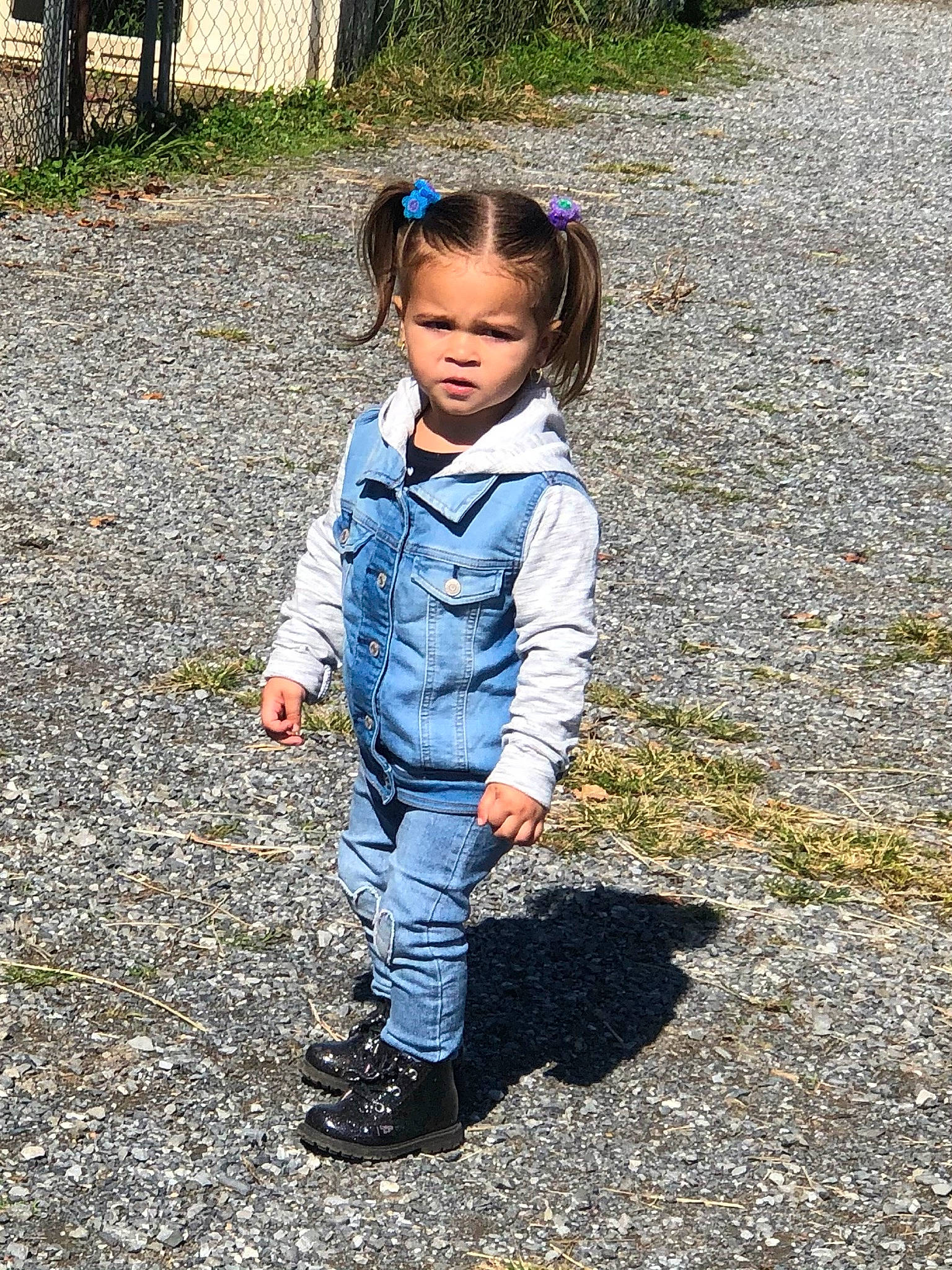 Shylee is registered to the contest to win money with this photo: child, denim, jacket, jeans, outerwear, person, play, shoe, smile, soil, toddler, vacation