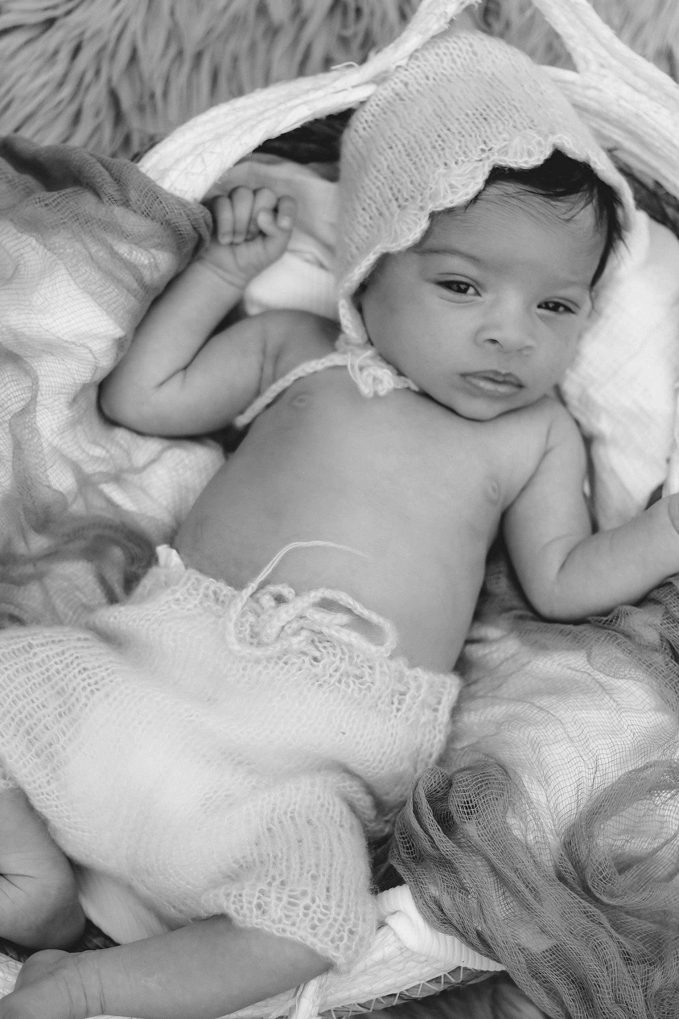 Kailani is registered to the contest to win money with this photo: abdomen, baby, black_and_white, chest, child, comfort, fashion_accessory, flash_photography, grass, happy, headgear, headwear, linens, monochrome, monochrome_photography, person, sitting, skin, smile, stock_photography