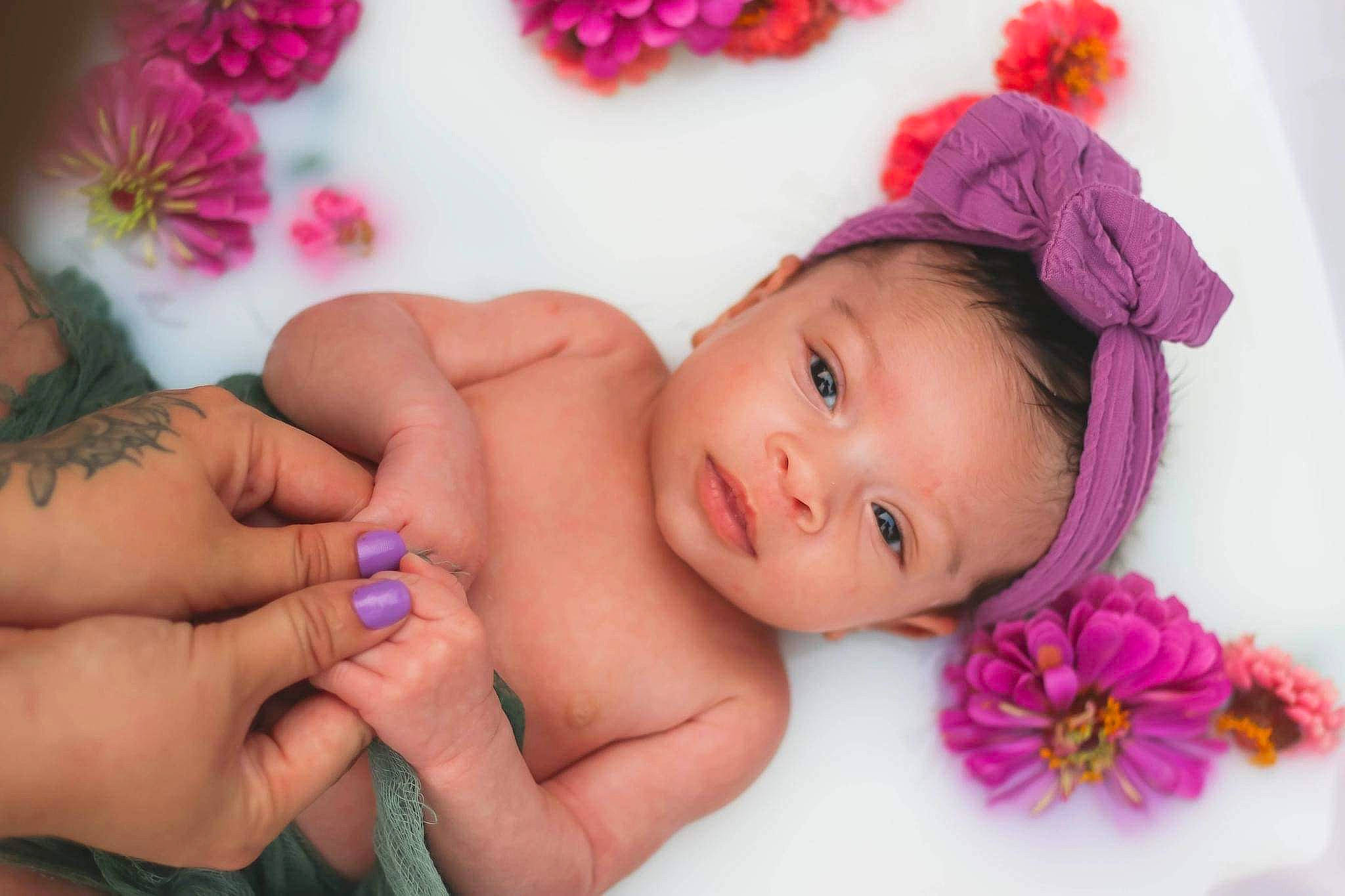 Kailani joined the competition — help win amazing prizes! arm, baby, baby_toddler_clothing, cheek, eye, eyebrow, eyelash, face, finger, gesture, hand, happy, head, lip, person, pink, product, purple, skin, textile