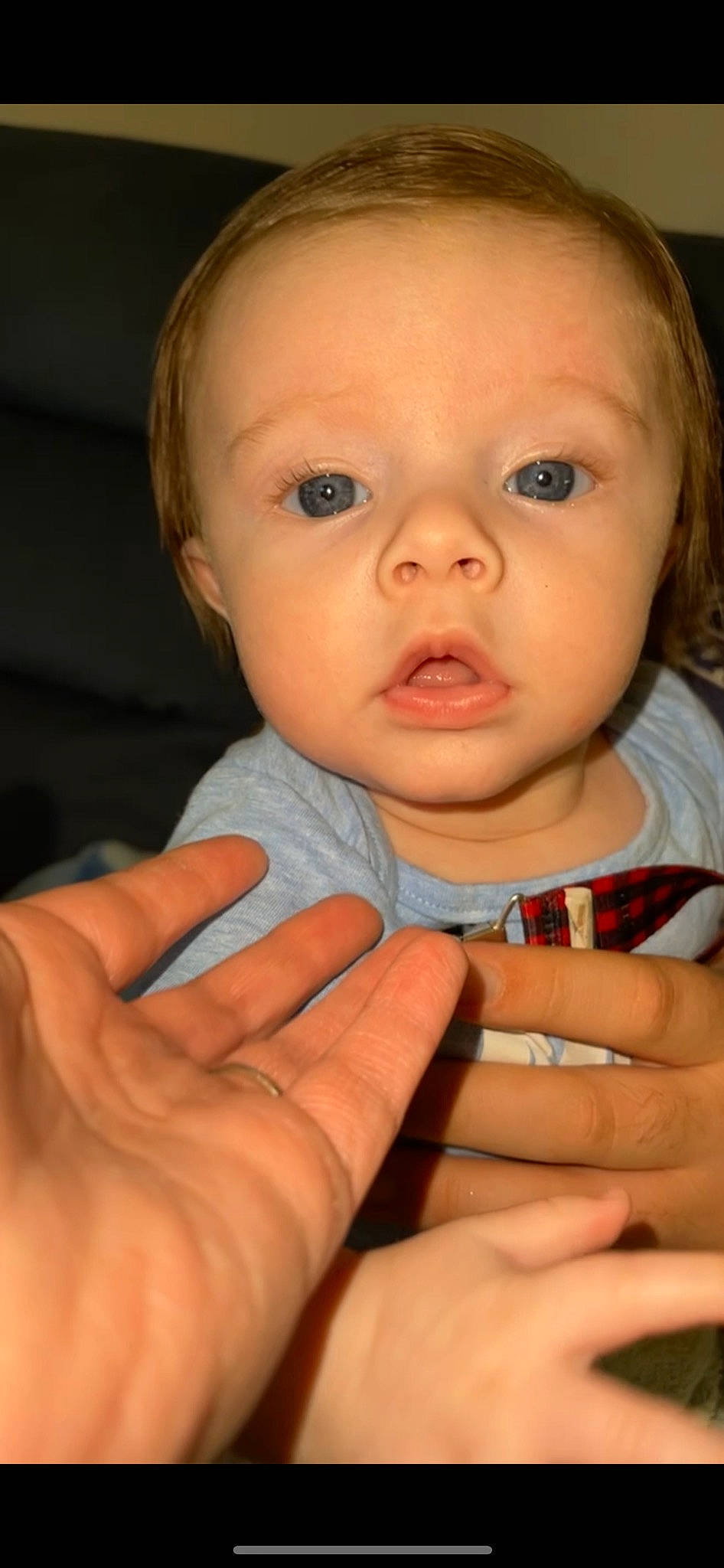 Aiden Maverick is registered to the contest to win money with this photo: arm, baby, cheek, ear, eye, eyebrow, eyelash, finger, gesture, hand, human_body, iris, lip, mouth, nail, neck, nose, person, skin, smile