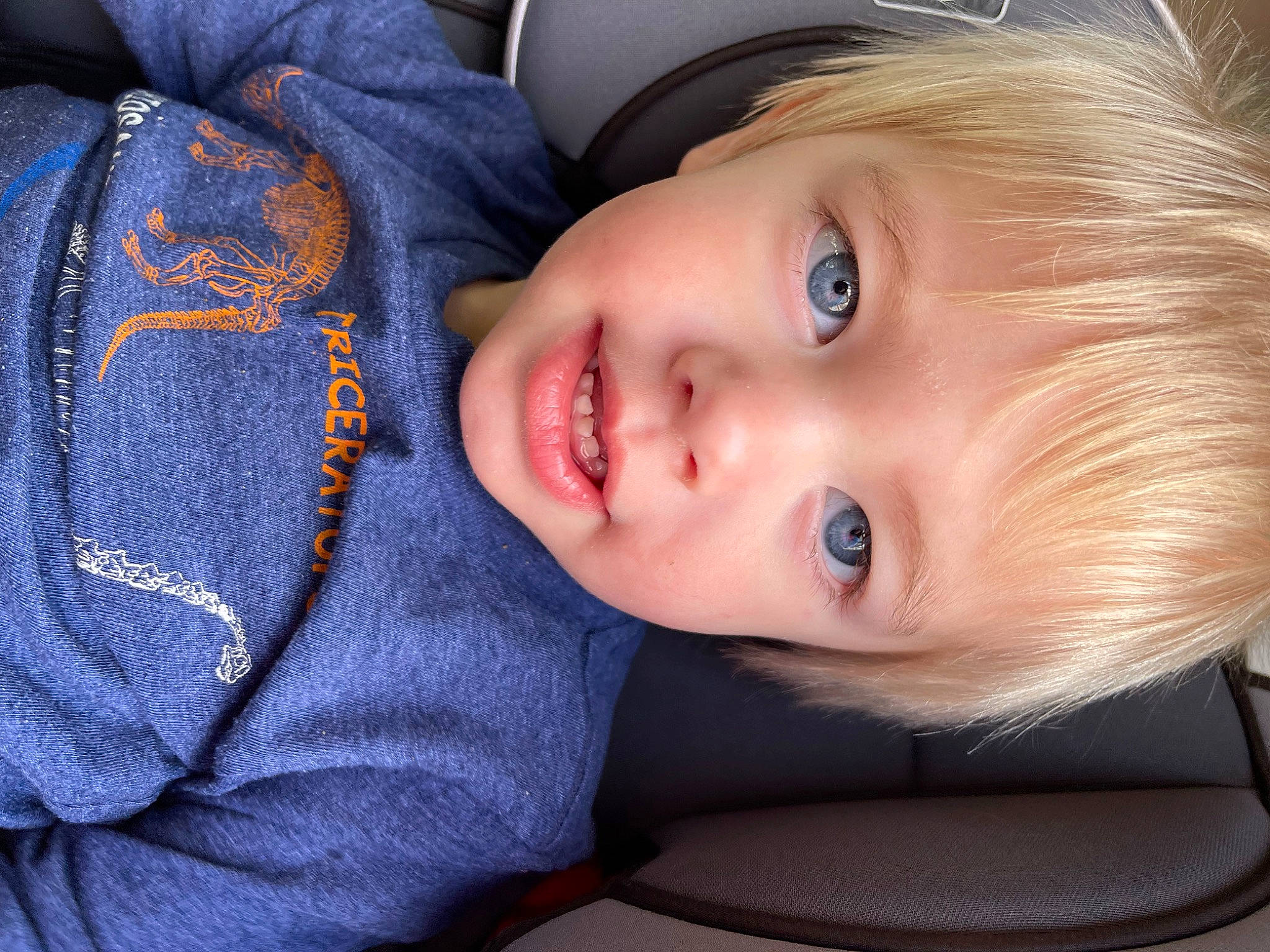 Kolton is registered to the contest to win money with this photo: baby, baby_toddler_clothing, cheek, comfort, electric_blue, eye, eyebrow, eyelash, face, flash_photography, hair, head, iris, lip, mouth, nose, person, skin, sleeve, smile