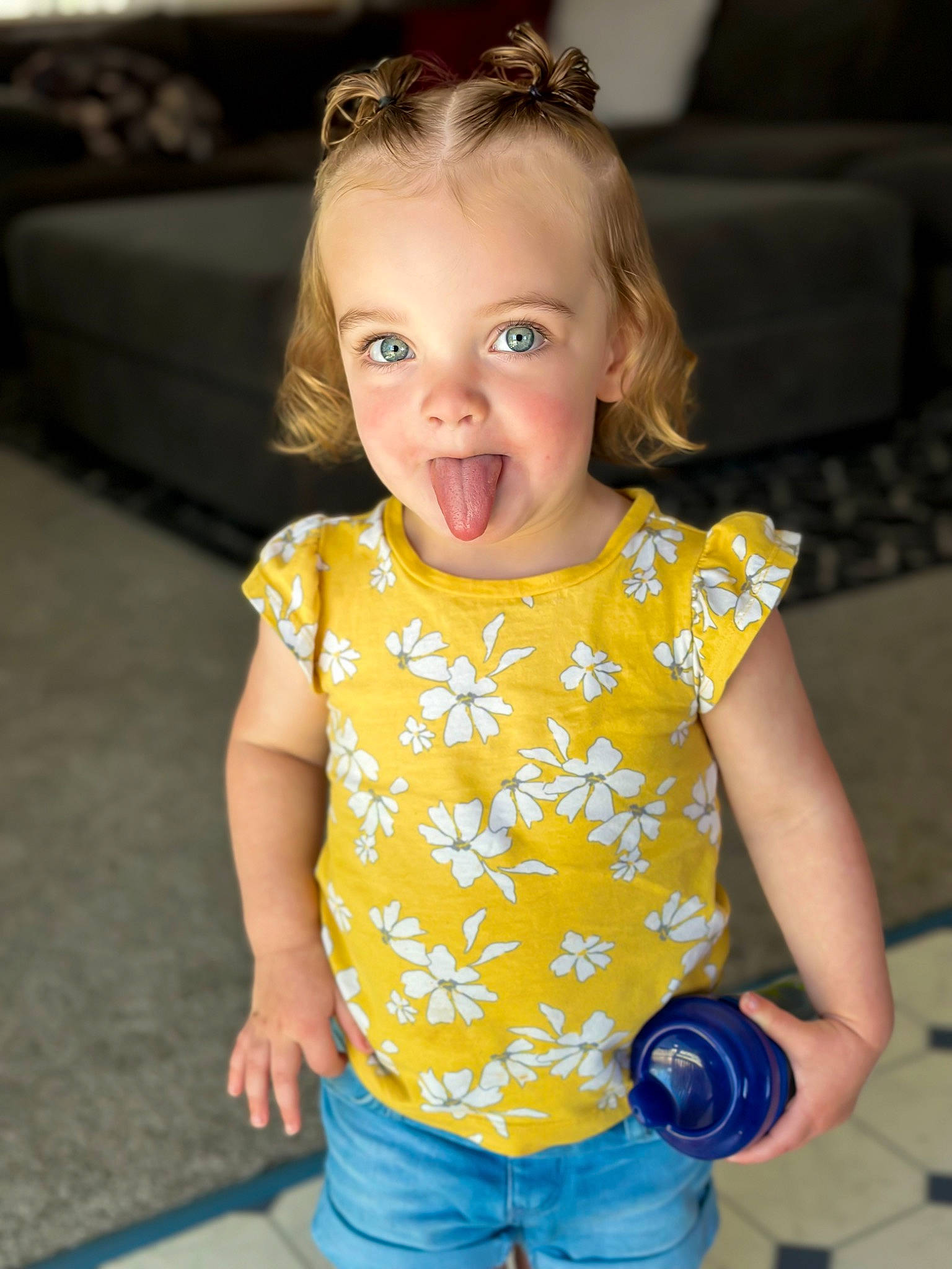 Lila joined the competition — help win amazing prizes! baby_toddler_clothing, blue, cheek, child, clothing, eye, face, fun, hair, happy, head, iris, person, shorts, skin, sleeve, smile, standing, t_shirt, toddler