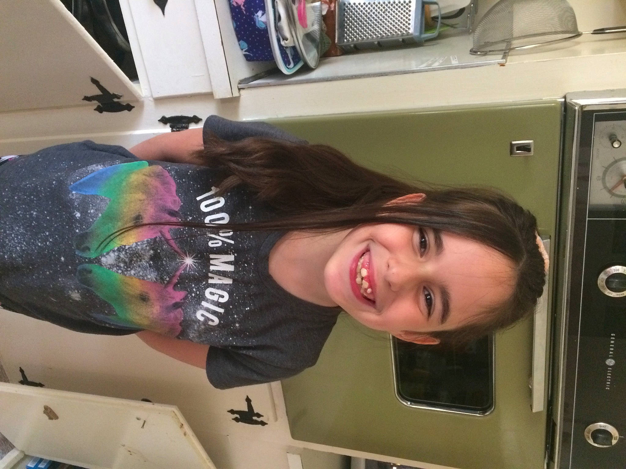 Stefani is registered to the contest to win money with this photo: abdomen, automotive_design, chest, elbow, eye, eyelash, face, fun, hairstyle, human_leg, joint, joy, machine, person, room, shoulder, smile, t_shirt, thigh, trunk