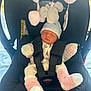 Aubrey is registered to the contest to win money with this photo: newborn, baby, car_seat, sleeping, knitwear, hat, socks, soft_toys, mobile, infant, child, seatbelt, cozy, indoor, cute, comfort, peaceful, person, baby_clothes, resting