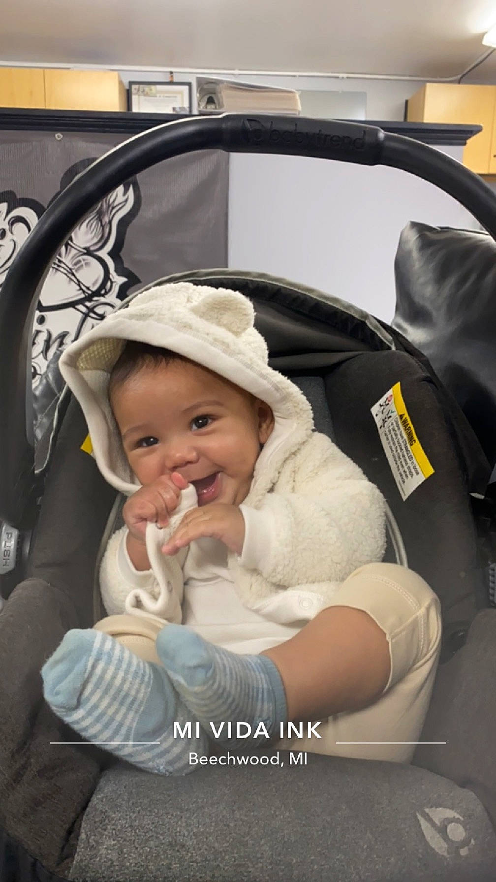 Alizae is registered to the contest to win money with this photo: auto_part, automotive_design, baby, baby_carriage, baby_in_car_seat, baby_products, cap, car_seat, child, comfort, event, happy, hat, headgear, luxury_vehicle, motor_vehicle, person, sitting, smile, toddler