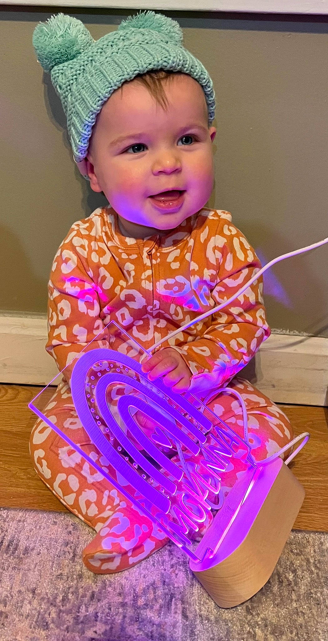 Mckenna is registered to the contest to win money with this photo: baby, baby_toddler_clothing, cake_decorating, cap, child, clothing, eye, facial_expression, fun, hairstyle, happy, head, magenta, person, pink, purple, skin, sleeve, smile, t_shirt