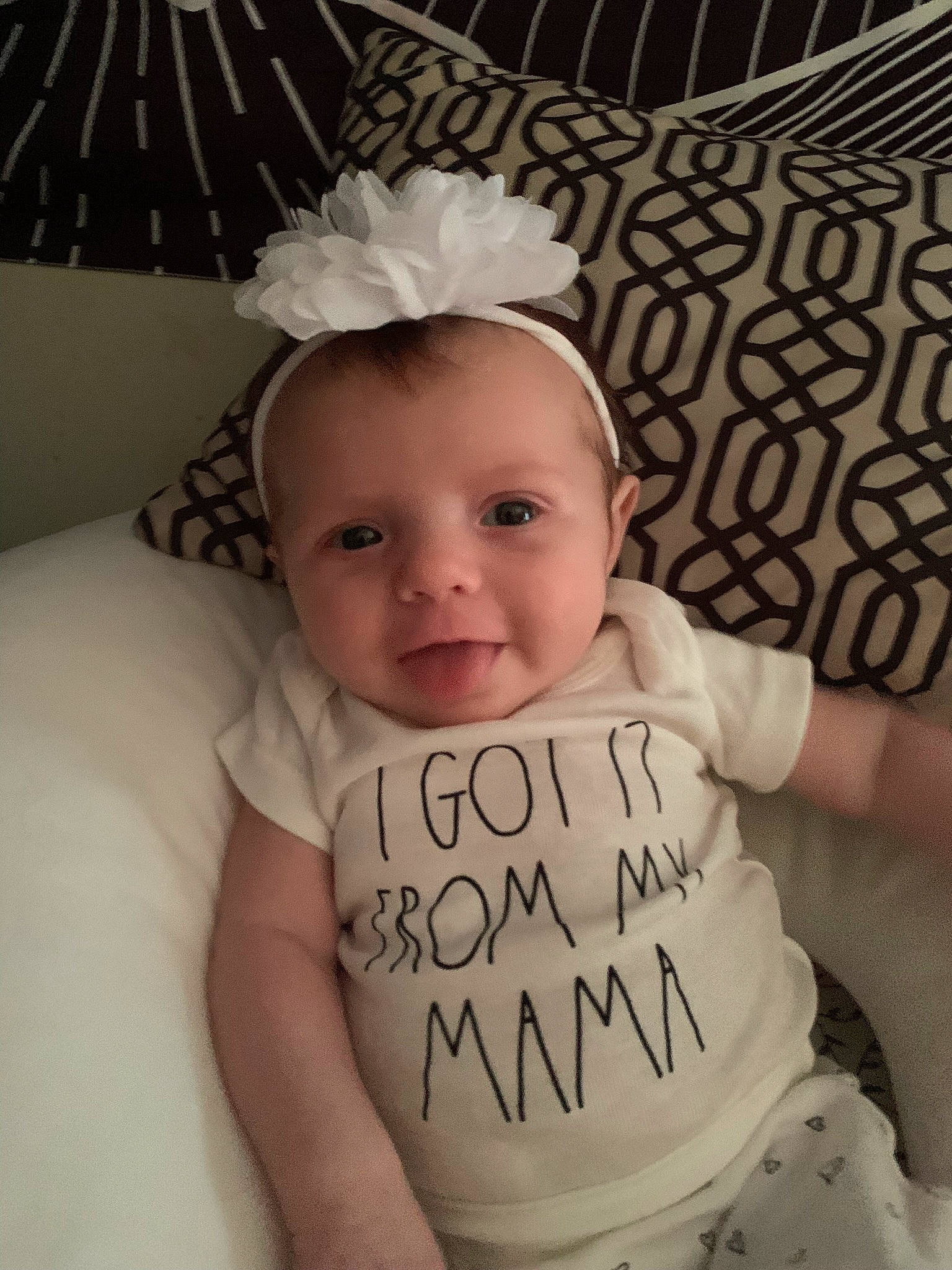 Ansley is registered to the contest to win money with this photo: baby, baby_toddler_clothing, cheek, comfort, cool, eyebrow, facial_expression, finger, hairstyle, handwriting, happy, head, headgear, person, product, skin, sleeve, smile, textile, toddler