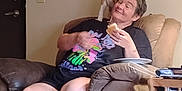 Summer Cali joined the competition — help win amazing prizes! brown, casual, chair, couch, curious, dog, door, furniture, home, indoor, light_switch, person, pet, plate, relaxing, sandwich, short_hair, shorts, table, tshirt