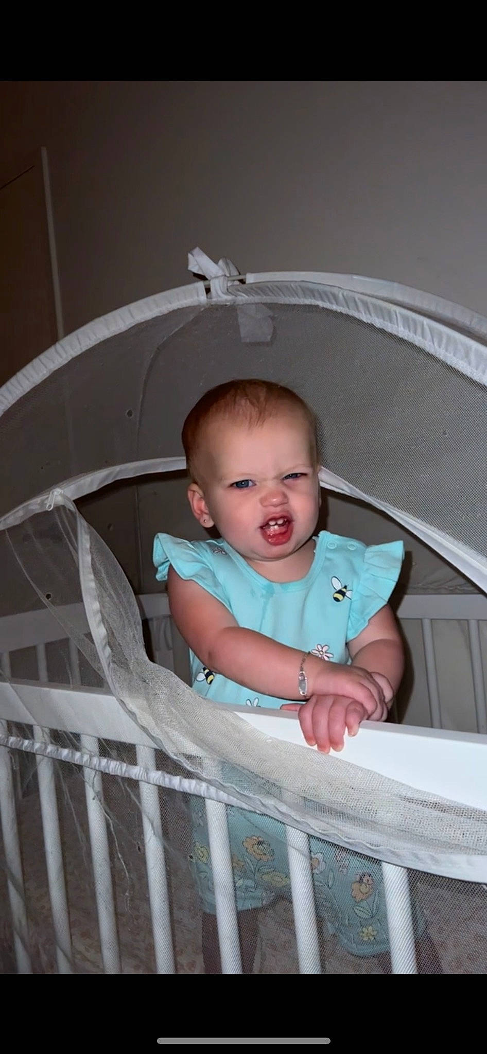 Marlee is registered to the contest to win money with this photo: baby, baby_products, baby_safety, baby_toddler_clothing, ceiling, cheek, child, circle, comfort, flash_photography, flooring, happy, infant_bed, iris, person, room, sitting, sleeve, t_shirt, toddler