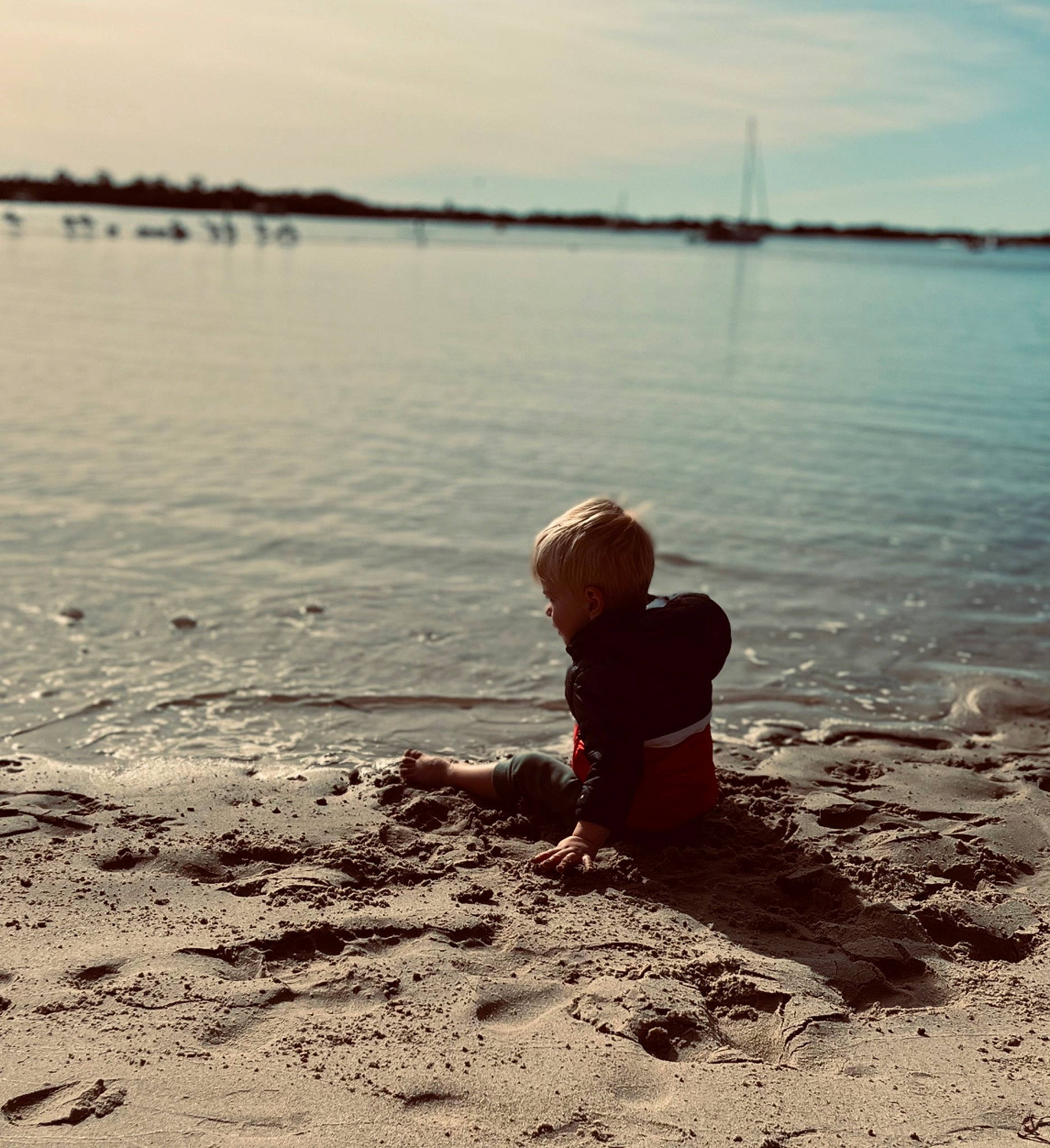 Myles joined the competition — help win amazing prizes! baby, beach, calm, cloud, coastal_and_oceanic_landforms, fun, happy, horizon, lake, landscape, people_in_nature, person, sky, sunlight, sunset, tints_and_shades, toddler, tree, under_exposed, water