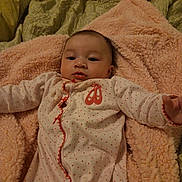 Harmony joined the competition — help win amazing prizes! baby, infant, child, portrait, lying_down, blanket, pink_blanket, bed, indoors, home, cozy, onesie, polka_dots, patterned_clothing, facial_expression, open_eyes, looking_at_camera, warm_lighting, close_up, cute
