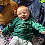 Noah is registered to the contest to win money with this photo: baby, bed, blanket, clothing, couch, cushion, electronics, face, furniture, head, homedecor, jeans, pants, person, phone, photography, portrait, quilt, sitting, t_shirt