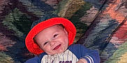 Noah joined the competition — help win amazing prizes! baby, blanket, cap, clothing, electronics, face, footwear, furniture, glove, happy, hat, head, mobilephone, pants, person, phone, photography, portrait, shoe, smile