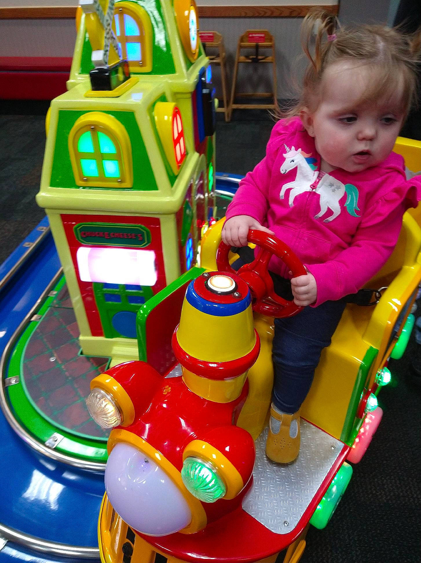 Esmeray is registered to the contest to win money with this photo: baby, baby_toddler_clothing, baby_toys, child, cleanliness, event, fun, green, leisure, machine, nonbuilding_structure, person, plastic, play, product, public_space, recreation, riding_toy, toddler, toy