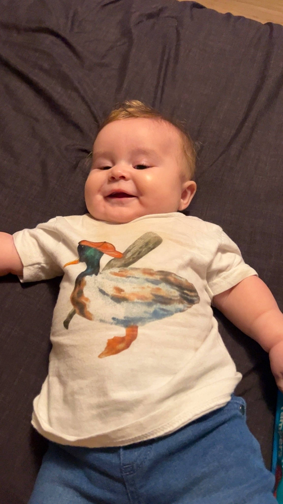 Jackson is registered to the contest to win money with this photo: abdomen, baby, baby_toddler_clothing, cheek, child, comfort, facial_expression, finger, fun, gesture, happy, human_body, iris, jeans, person, skin, sleeve, smile, t_shirt, toddler