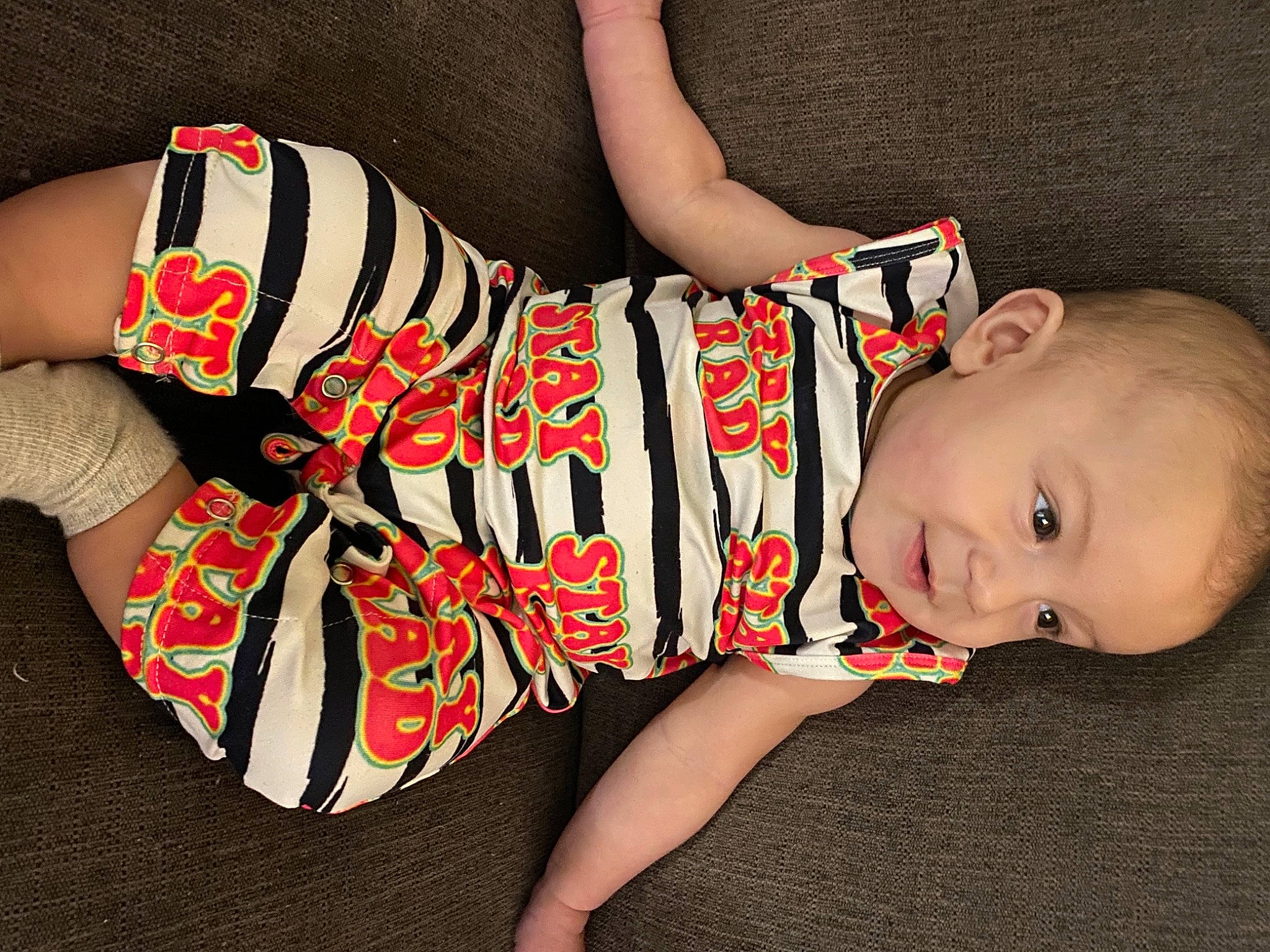 Kase joined the competition — help win amazing prizes! baby_toddler_clothing, finger, hand, human_body, human_leg, joint, knee, leg, nail, neck, pattern, person, product, sleeve, smile, textile, thigh, toddler, trunk, waist