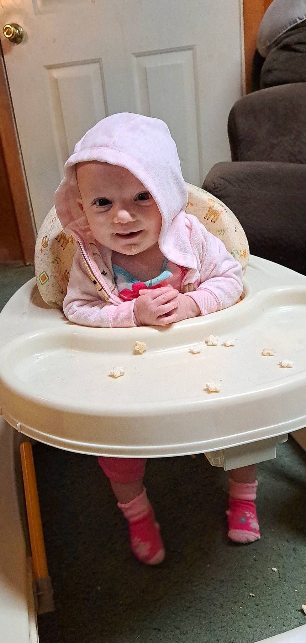Amara is registered to the contest to win money with this photo: baby, baby_products, baby_toddler_clothing, chair, child, circle, comfort, couch, fashion_accessory, happy, headwear, linens, magenta, pattern, person, pink, sitting, skin, sleeve, toddler