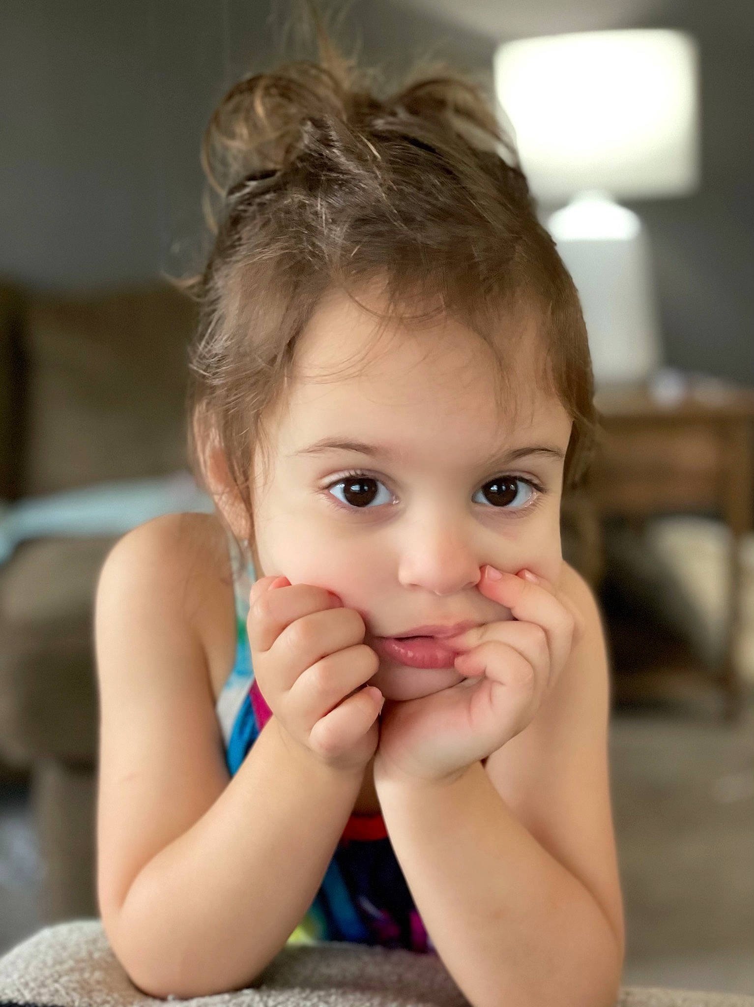 Sadie is registered to the contest to win money with this photo: blond, brown_hair, cheek, child, eye, eyebrow, eyelash, flash_photography, fun, gesture, happy, iris, lip, nail, nose, person, sitting, skin, smile, thumb