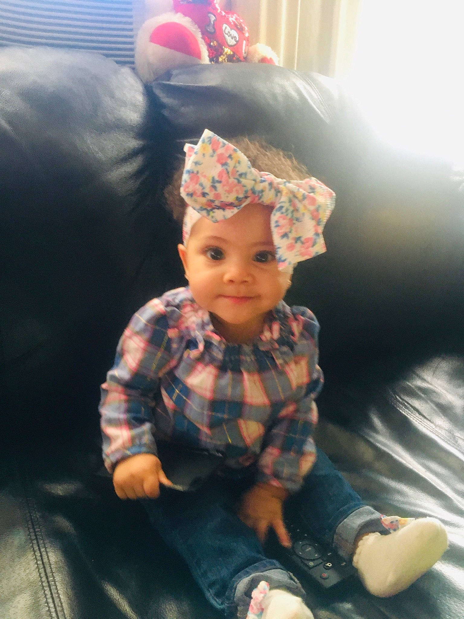 Harmony joined the competition — help win amazing prizes! beanie, cap, child, chin, comfort, couch, doll, fashion_accessory, fun, hat, headgear, headwear, pattern, person, personal_protective_equipment, plaid, sitting, sleeve, toddler, toy