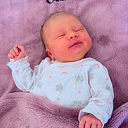 Elena a rejoint le concours — aidez-le/la à gagner de superbes lots ! newborn, baby, sleeping, blanket, lavender, onesie, cute, infant, soft, cozy, child, face, hand, peaceful, clothing, pattern, stars, cats, portrait, resting