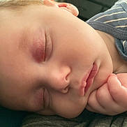 Axl joined the competition — help win amazing prizes! baby, child, close_up, cute, eyelashes, face, hand, indoors, infant, lips, nose, onesie, peaceful, portrait, resting, rosy_cheeks, skin, sleeping, soft_light, striped_clothing