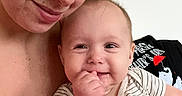 Axl joined the competition — help win amazing prizes! affection, baby, child, closeup, cute, face, family, hand, happy, holding, human, indoor, infant, love, mother, person, portrait, skin, smile, striped_clothing