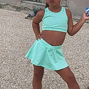 Alba participe au concours pour gagner de l'argent avec cette photo : attitude, background, casual, child, confident, fashion, girl, gravel_ground, hand_on_hip, mint_green, old_door, outdoor, person, pose, socks, sporty_outfit, standing, visor, white_shoes, young