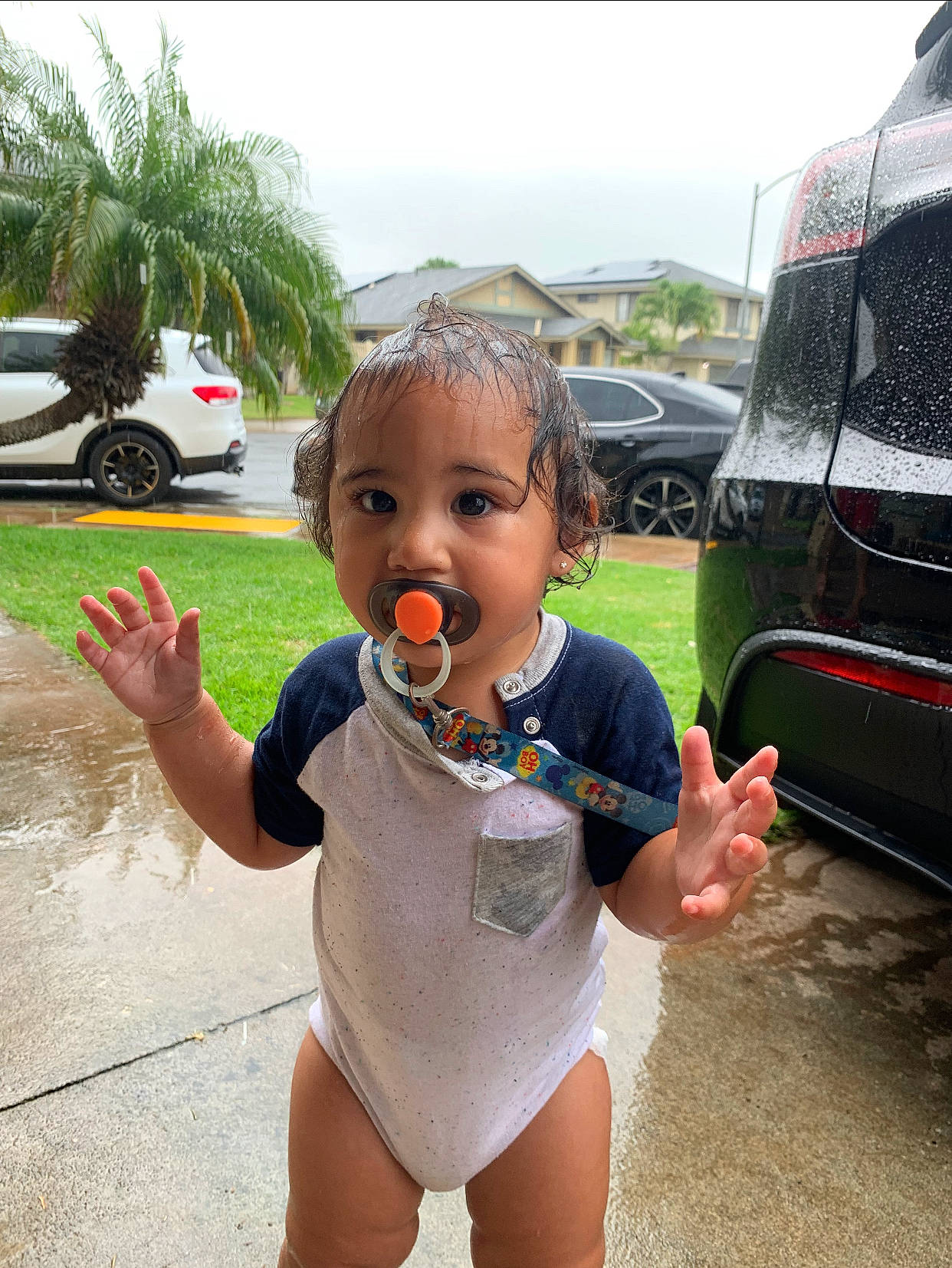 Storm is registered to the contest to win money with this photo: arm, automotive_tire, car, cool, finger, grass, hand, happy, leisure, leotard, maillot, motor_vehicle, one_piece_swimsuit, person, plant, recreation, swimwear, thigh, tire, tree