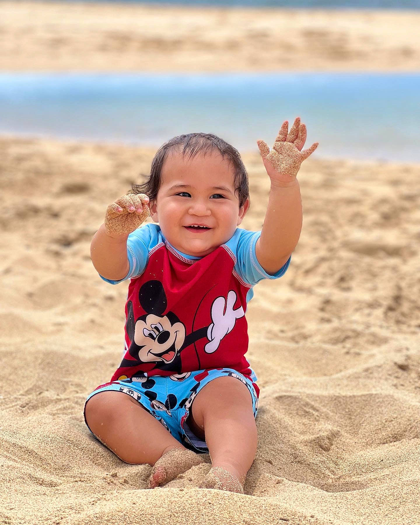 Storm joined the competition — help win amazing prizes! azure, baby_toddler_clothing, beach, fun, happy, head, horizon, joy, landscape, leisure, natural_environment, people_in_nature, people_on_beach, person, sand, sleeve, smile, t_shirt, thigh, toddler