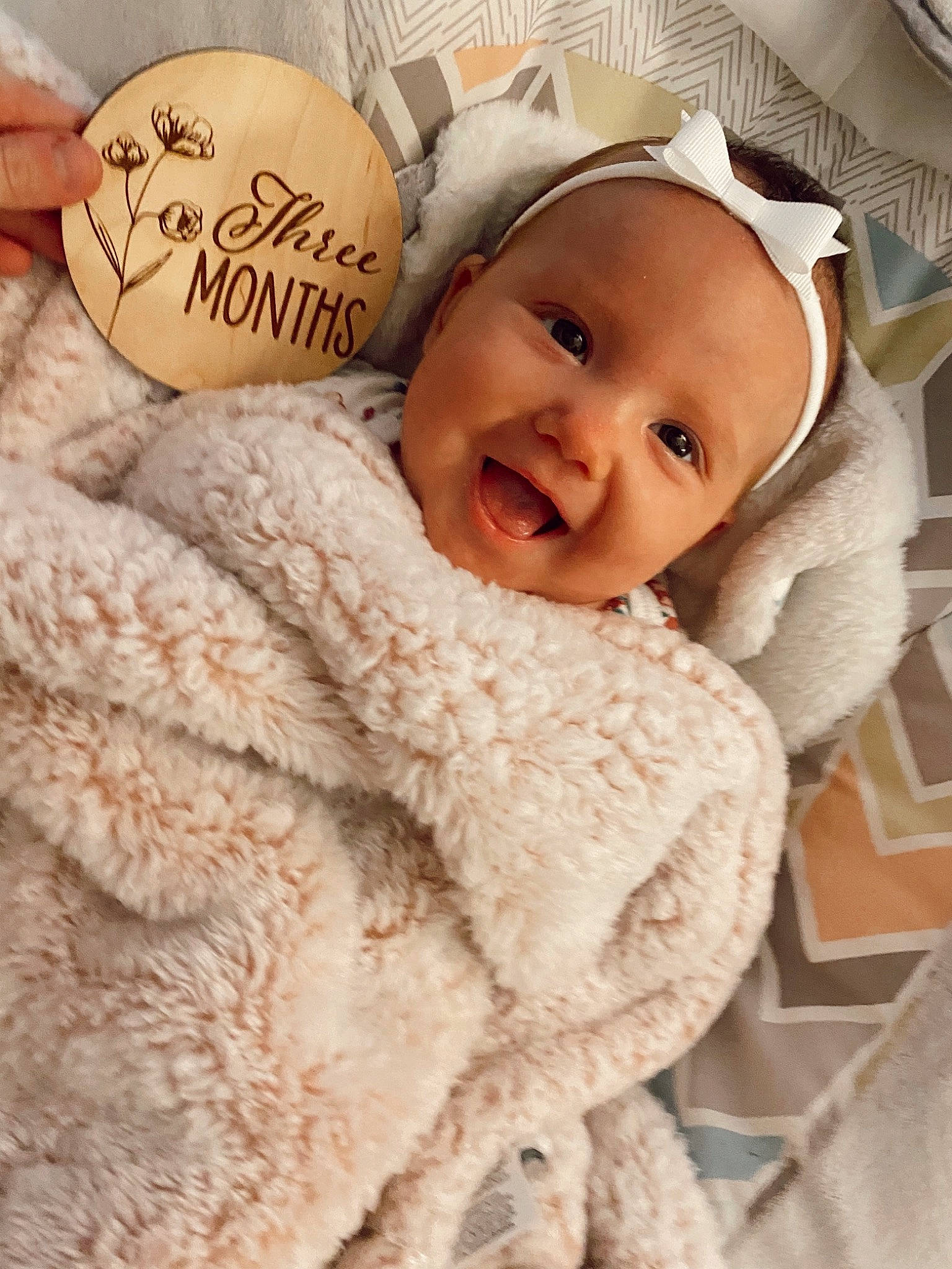 Everleigh joined the competition — help win amazing prizes! baby, baby_products, baby_sleeping, baby_toddler_clothing, cap, child, comfort, fashion_accessory, fur, gesture, handwriting, happy, hat, headgear, linens, outerwear, person, skin, smile, textile