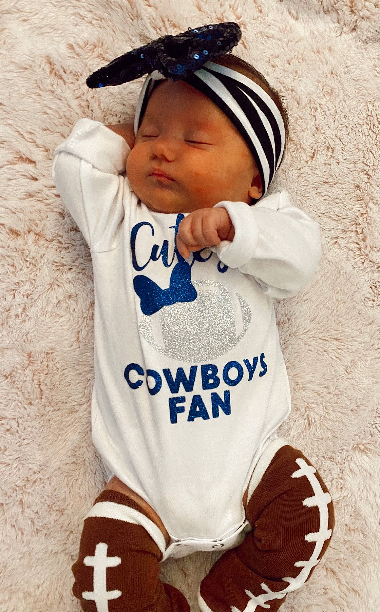 Everleigh is registered to the contest to win money with this photo: baby, baby_products, baby_toddler_clothing, cap, child, cool, electric_blue, face, fashion_accessory, font, hairstyle, happy, headwear, outerwear, pattern, person, sleeve, sportswear, street_fashion, t_shirt