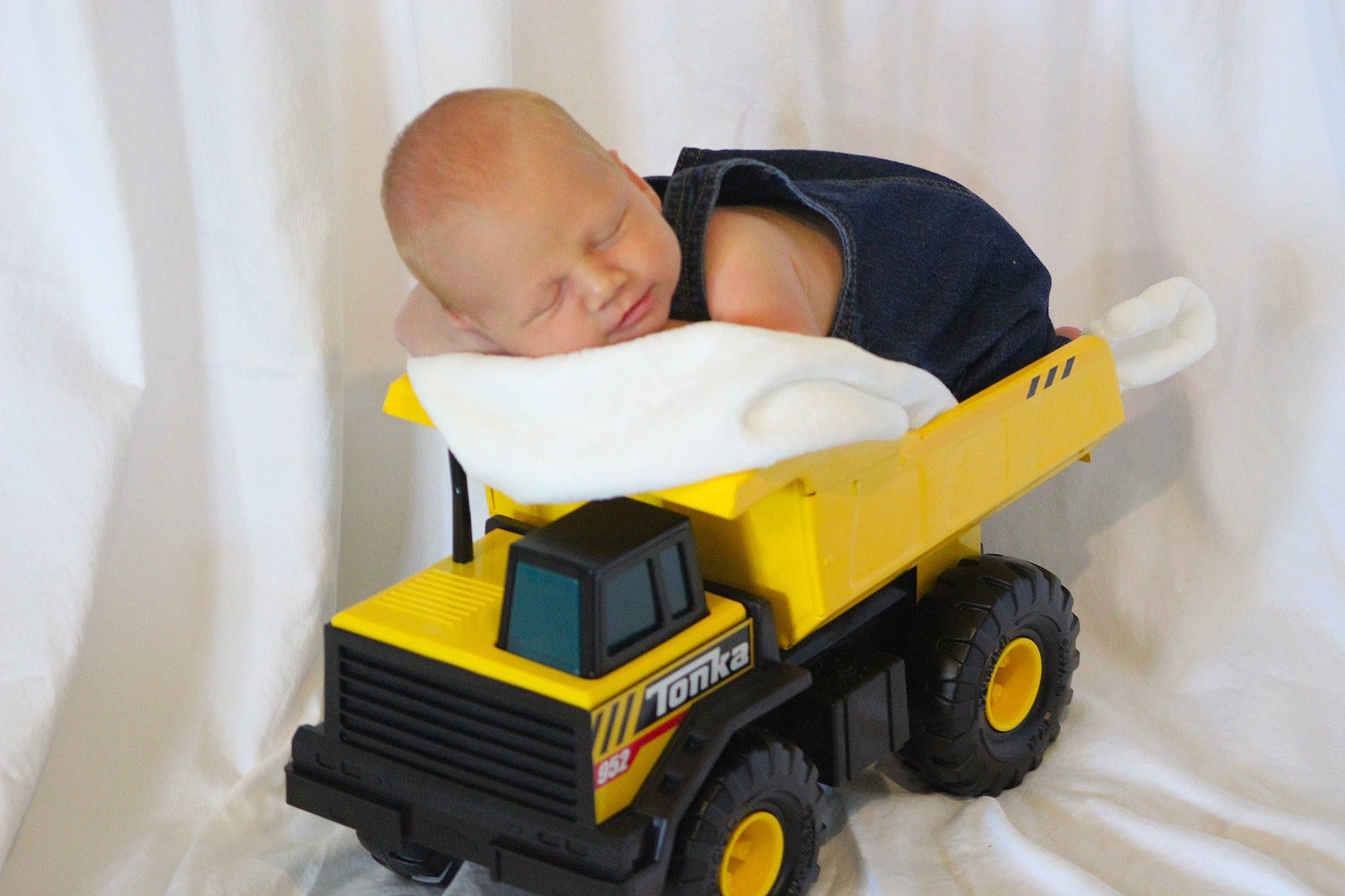 Danny joined the competition — help win amazing prizes! automotive_design, automotive_tire, automotive_wheel_system, baby, baby_products, baby_toddler_clothing, comfort, flooring, motor_vehicle, person, plastic, product, rolling, sitting, tire, toddler, toy, toy_vehicle, tread, wheel