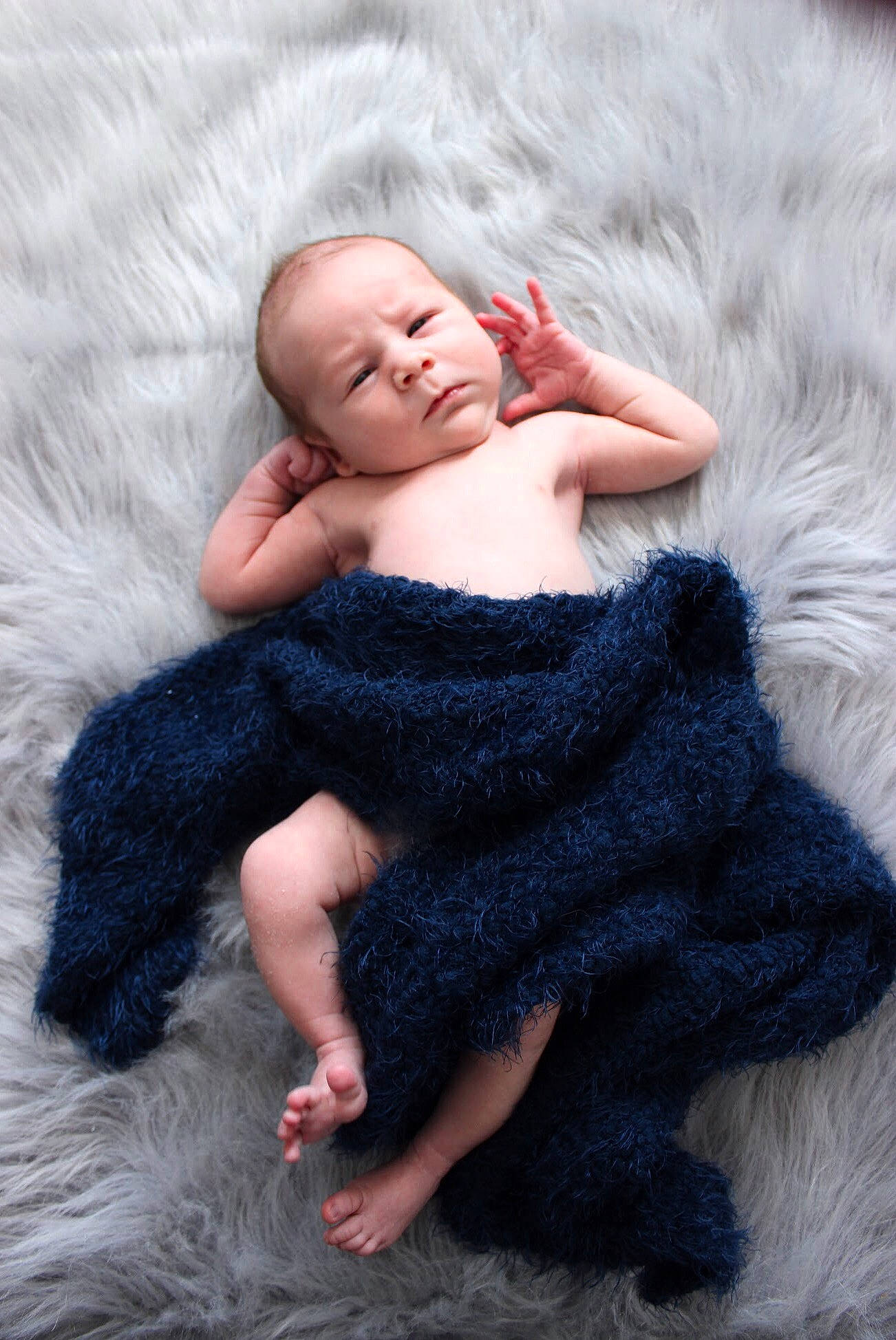 Beaux is registered to the contest to win money with this photo: art, baby, child, fur, fur_clothing, knitting, natural_material, person, photography, skin, textile, toddler, wool