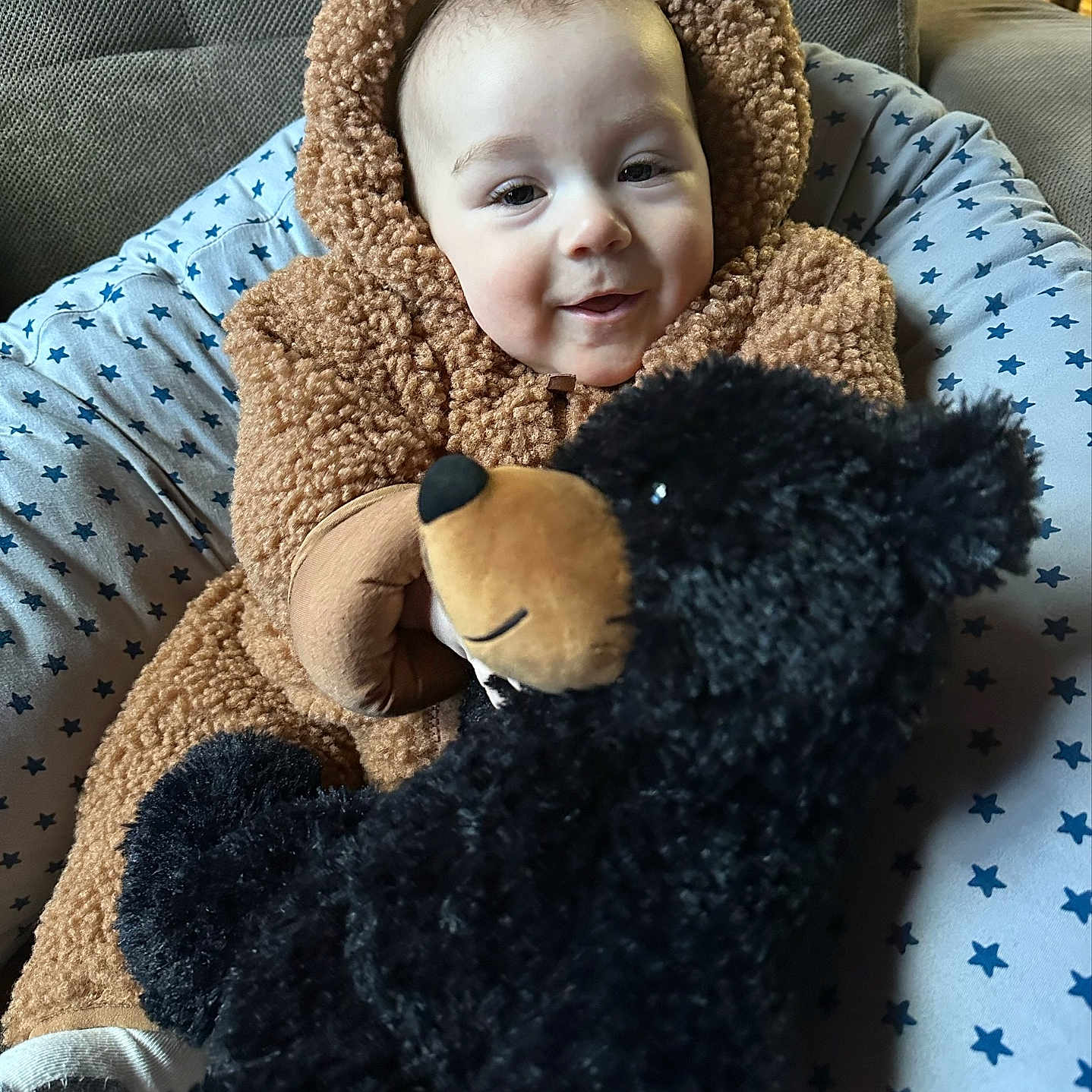 Jacob joined the competition — help win amazing prizes! baby, blanket, clothing, coat, couch, cushion, face, furniture, happy, hat, head, homedecor, jacket, person, photography, pillow, portrait, quilt, smile, toy