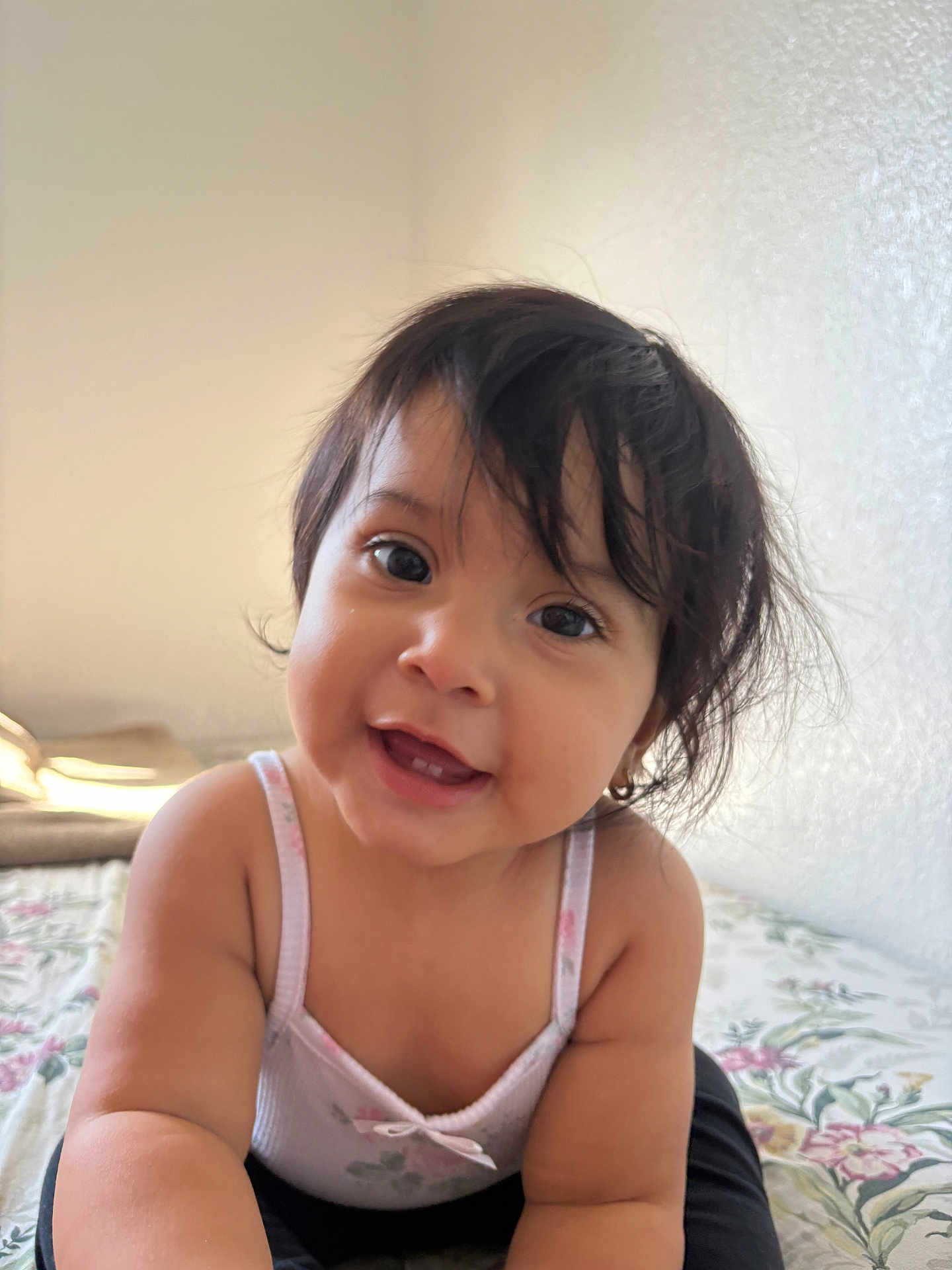 Marelyn joined the competition — help win amazing prizes! toddler, child, smiling, indoor, bed, floral, tank_top, cute, happy, face, person, portrait, hair, skin, baby, young_child, infant, eyes, expression, crawling