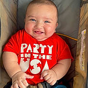 Muhammad joined the competition — help win amazing prizes! baby, baby_face, baby_hands, blue_shorts, casual, child, chubby_cheeks, clothing, cute, happy, indoor, infant, infant_clothing, person, portrait, red_shirt, seatbelt, sitting, smiling, stroller