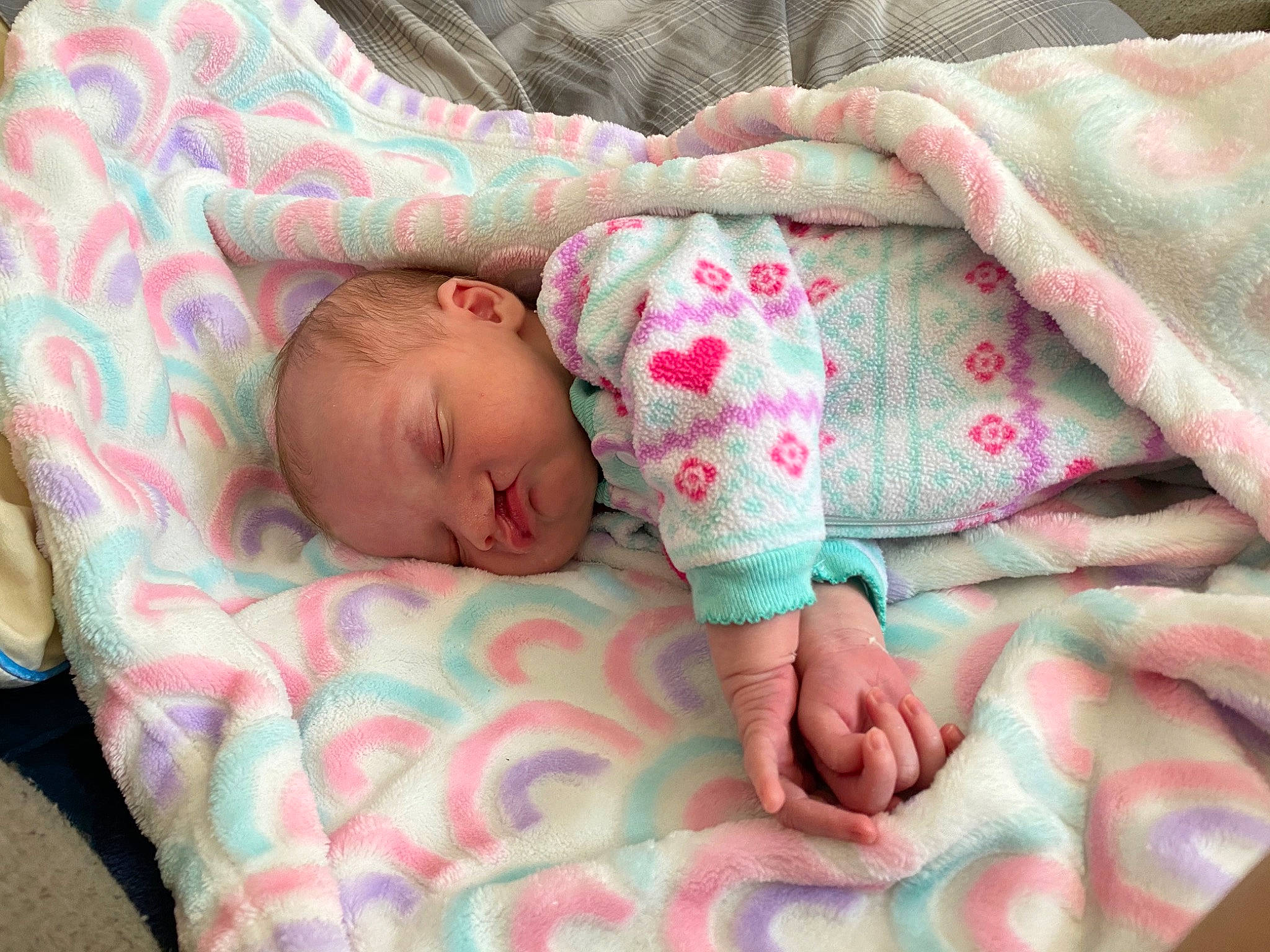 Evie is registered to the contest to win money with this photo: baby, baby_products, baby_sleeping, bedding, bedtime, birth, blanket, child, comfort, hand, linens, nap, nap_mat, person, pink, product, room, skin, sleep, textile