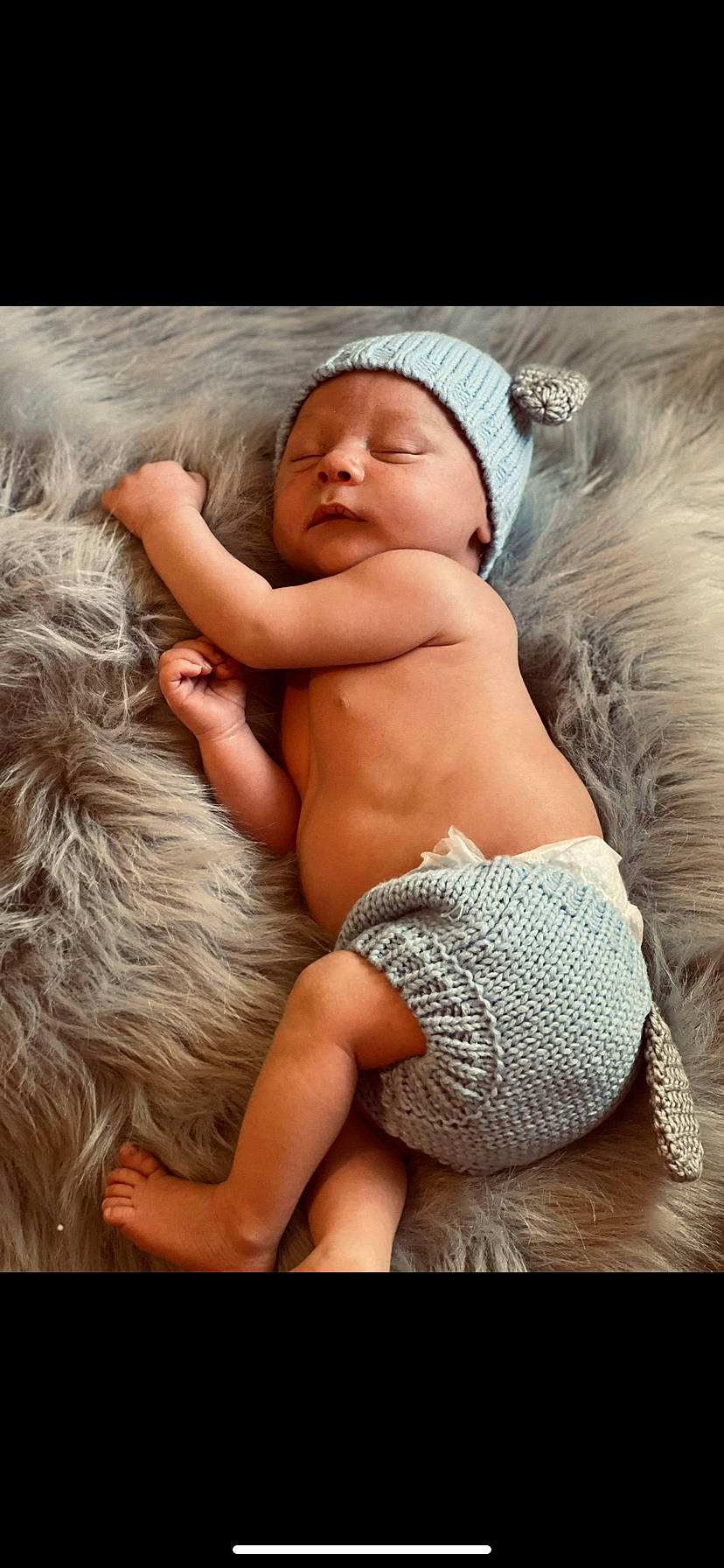 Jaxon is registered to the contest to win money with this photo: abdomen, baby, baby_sleeping, barechested, barefoot, chest, comfort, diaper, happy, human_body, human_leg, linens, navel, person, stomach, teddy_bear, textile, thigh, toddler, trunk