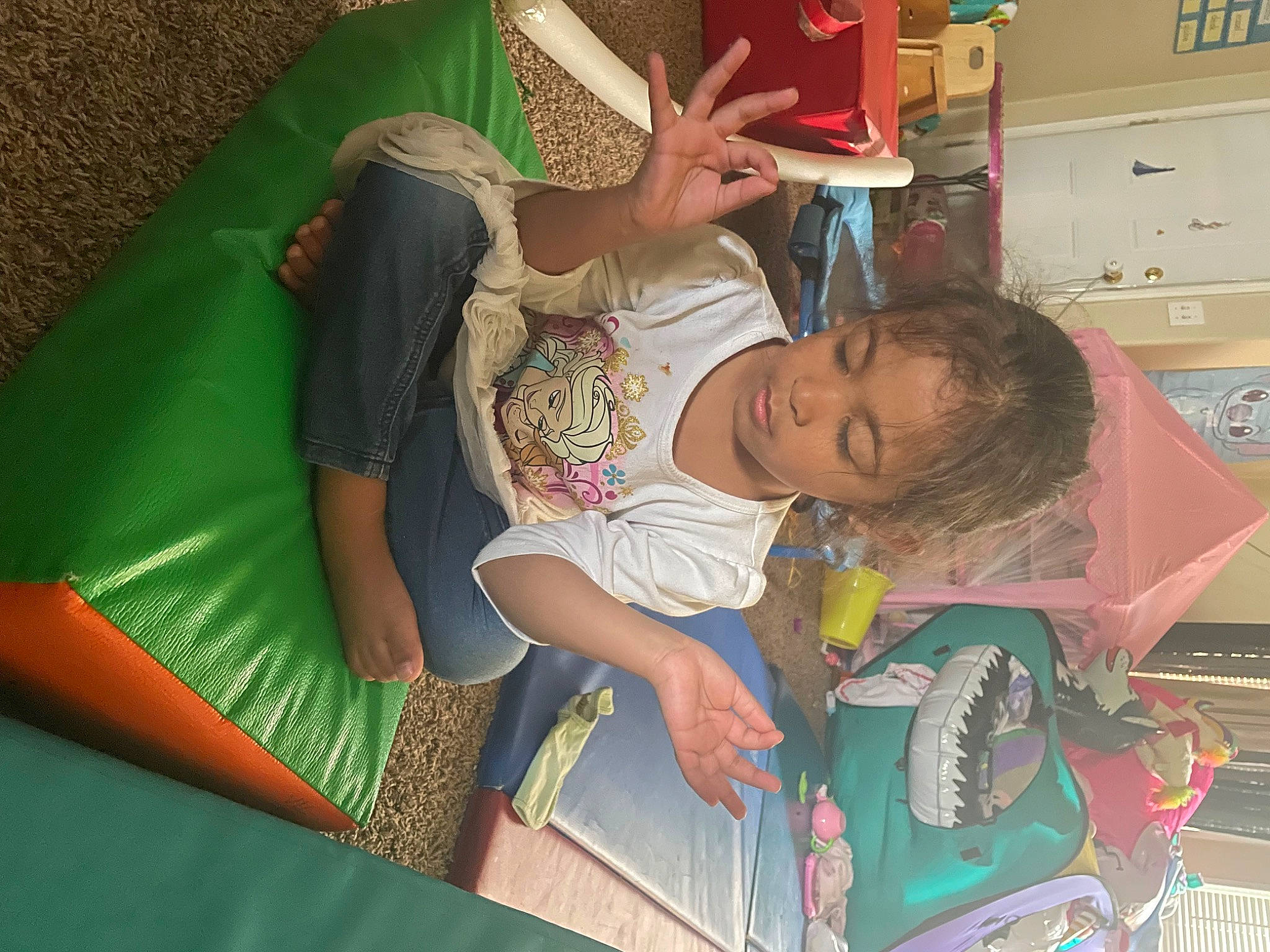 Rosalee is registered to the contest to win money with this photo: baby, baby_products, box, child, comfort, fun, hat, human_leg, lap, leisure, person, play, room, service, shorts, t_shirt, textile, thigh, toddler, toy