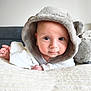 Ayden a rejoint le concours — aidez-le/la à gagner de superbes lots ! baby, infant, child, hood, fluffy_hood, blanket, plush_toy, soft_toy, bed, towel, portrait, closeup, eyes, looking_at_camera, cute, cozy, indoors, skin, headwear, smile