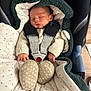 Liam participe au concours pour gagner de l'argent avec cette photo : baby, blanket, car_seat, child, comfort, cozy, cute, ears, fabric, hood, indoors, infant, knitwear, newborn, pattern, peaceful, resting, safety_harness, sleeping, soft
