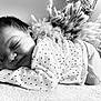 adorable, baby, black_and_white, calm, child, close_up, cozy, cute, fluffy_plants, indoor, infant, monochrome, peaceful, person, polka_dot, portrait, resting, sleeping, soft_surface, young