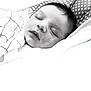 Apolline participe au concours pour gagner de l'argent avec cette photo : baby, sleeping, blanket, infant, face, closeup, portrait, peaceful, cozy, monochrome, black_and_white, soft, newborn, resting, cute, child, wrapped, quiet, young, serene
