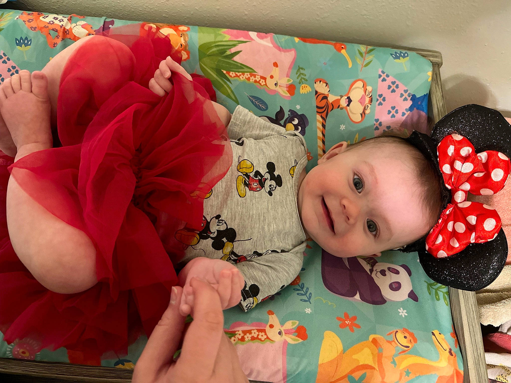 Alice is registered to the contest to win money with this photo: baby, baby_products, baby_toddler_clothing, bed_sheet, bedding, cheek, child, comfort, head, joy, linens, pattern, person, petal, pink, plush, room, rose, stuffed_toy, textile