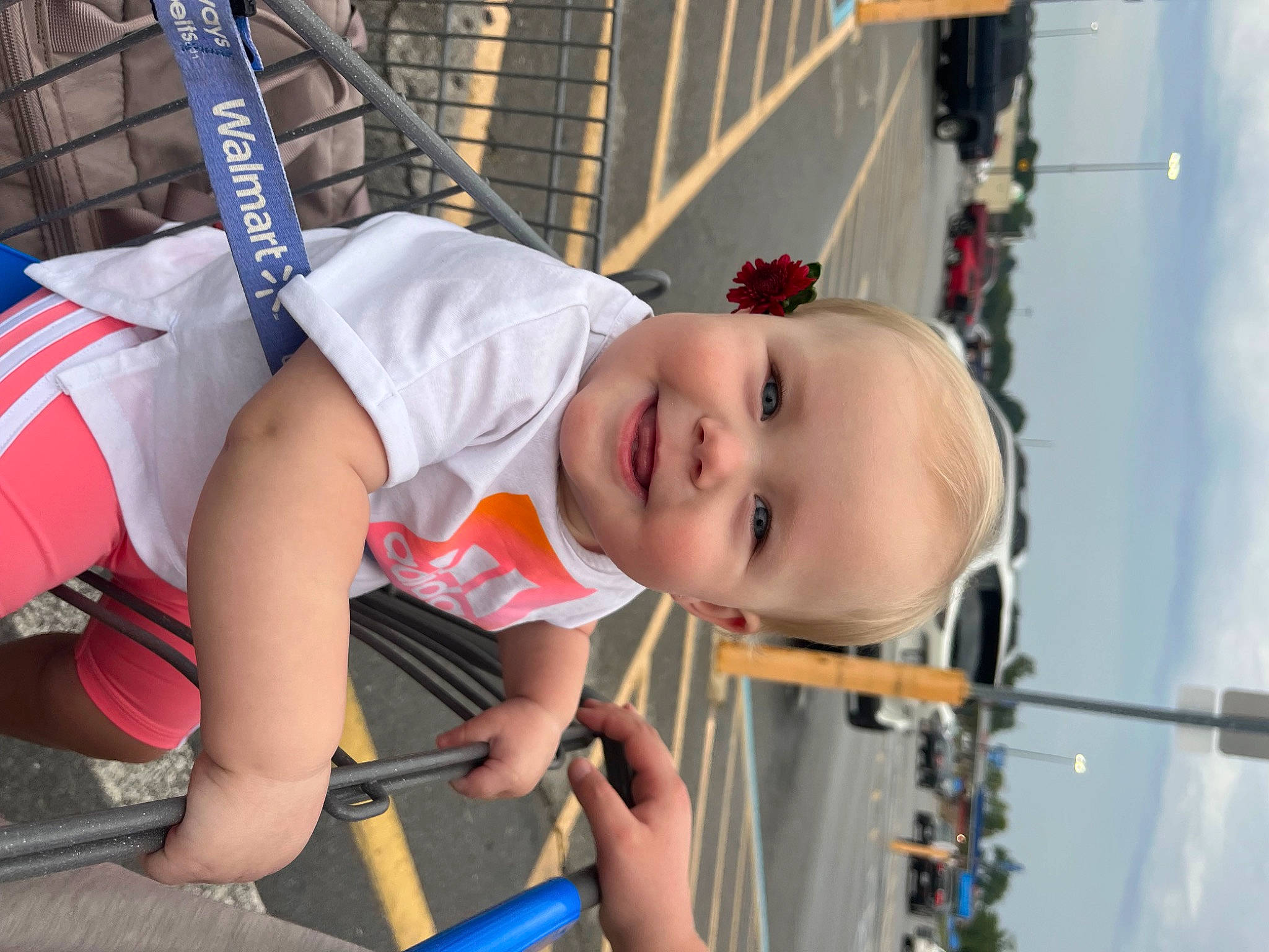 Shylin is registered to the contest to win money with this photo: arm, auto_part, automotive_exterior, automotive_wheel_system, baby, baby_products, child, city, eye, fun, joy, leisure, person, recreation, shorts, sky, smile, t_shirt, tire, toddler