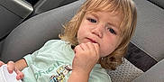 Oliver joined the competition — help win amazing prizes! toddler, child, car_seat, car_interior, blonde_hair, tshirt, woody_character, cup, seatbelt, portrait, thinking, casual_clothing, indoor, seat, person, young_child, cute, sitting, light, daylight