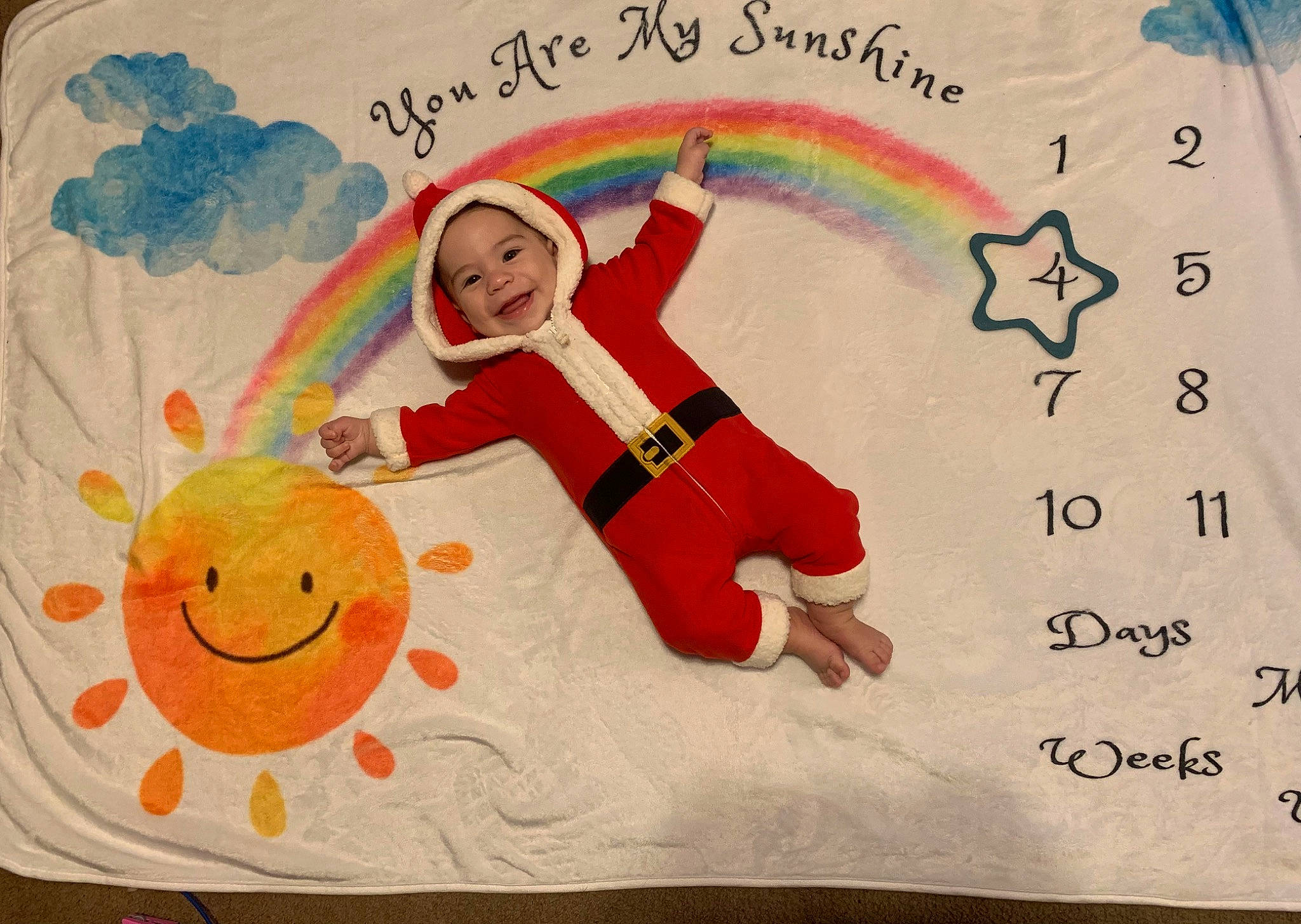 Karsen is registered to the contest to win money with this photo: art, child_art, circle, design, drawing, facial_expression, font, handwriting, happy, headwear, illustration, joy, line, organism, paper, pattern, person, rainbow, rectangle, smile