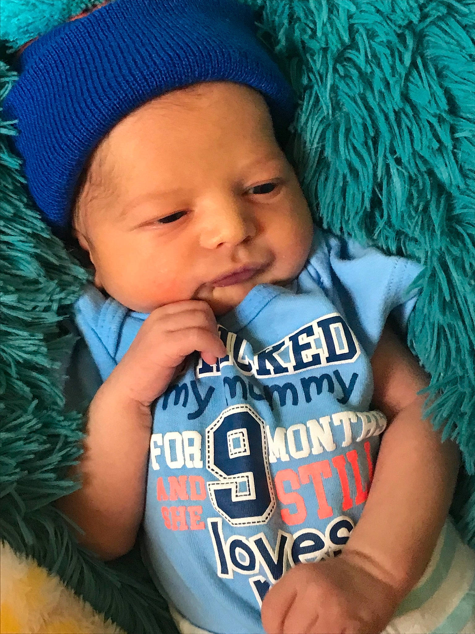 Greyson joined the competition — help win amazing prizes! baby, baby_products, baby_toddler_clothing, beanie, blue, bonnet, cap, cheek, child, cool, headgear, knit_cap, knitting, male, nose, outerwear, person, product, skin, toddler