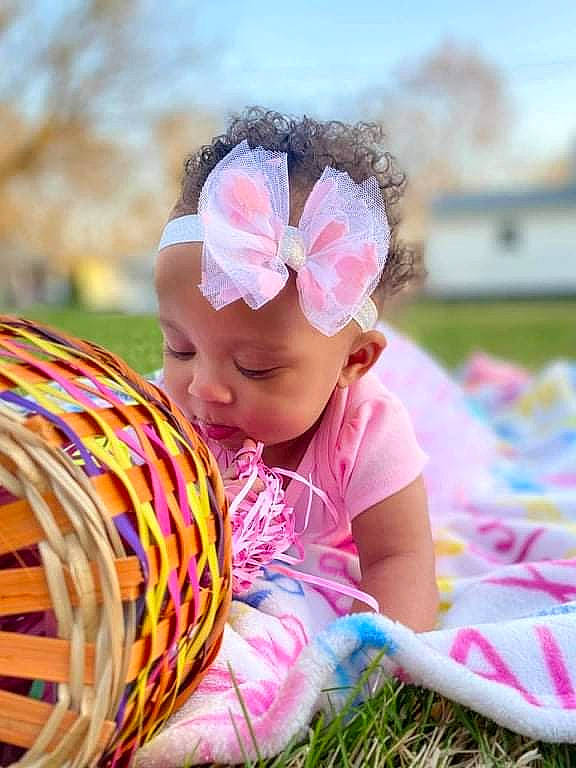 Halo joined the competition — help win amazing prizes! baby, baby_toddler_clothing, child, flower, fun, grass, grassland, happy, hat, headgear, headwear, leisure, people_in_nature, person, pink, plant, recreation, sitting, sky, smile
