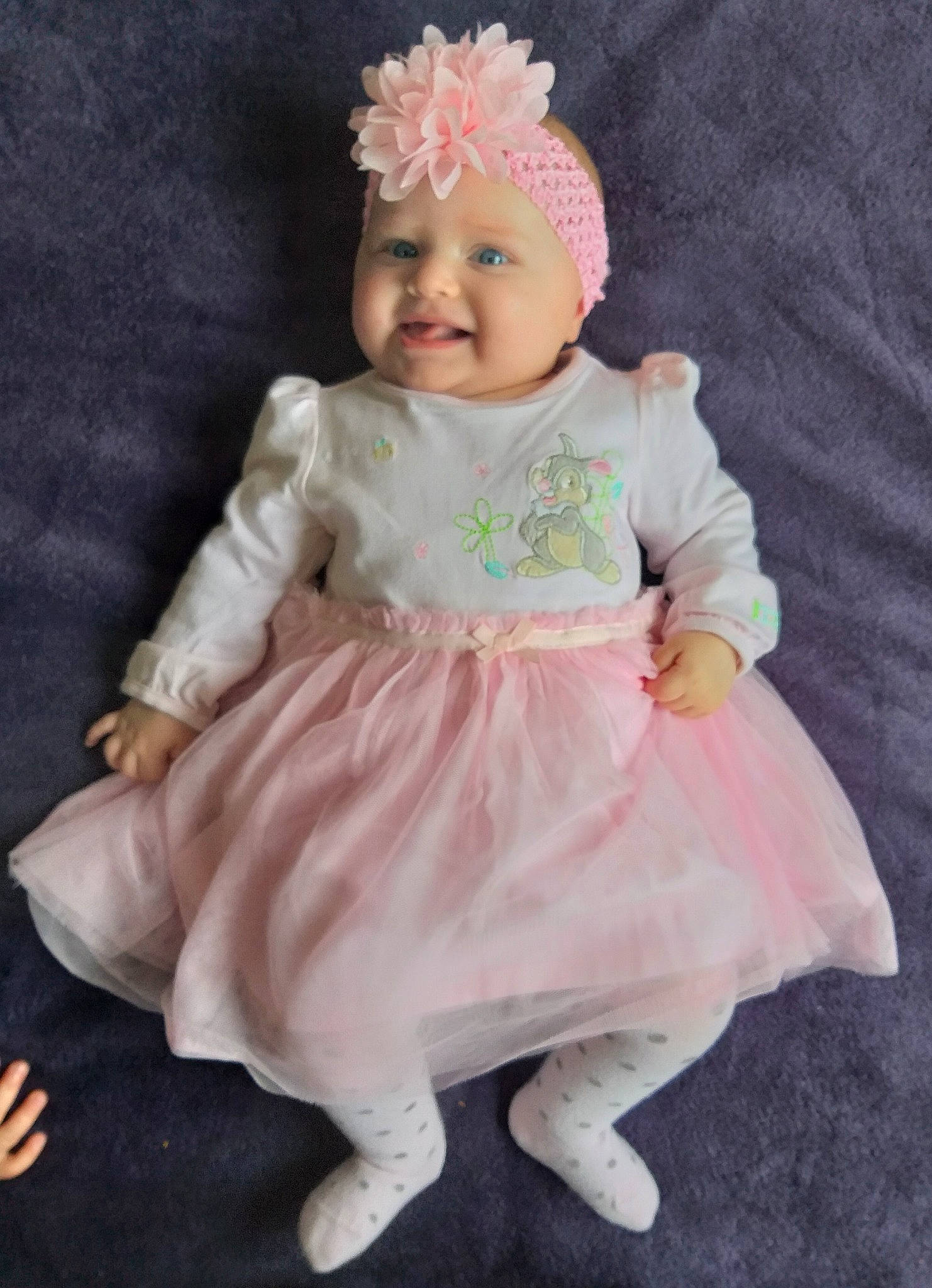 Luna participe au concours pour gagner de l'argent avec cette photo : child, doll, figurine, hair_accessory, headgear, infant, joy, person, pink, product, skin, toddler